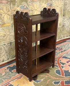 English Arts & Crafts Carved Oak Revolving Bookcase. C 1910